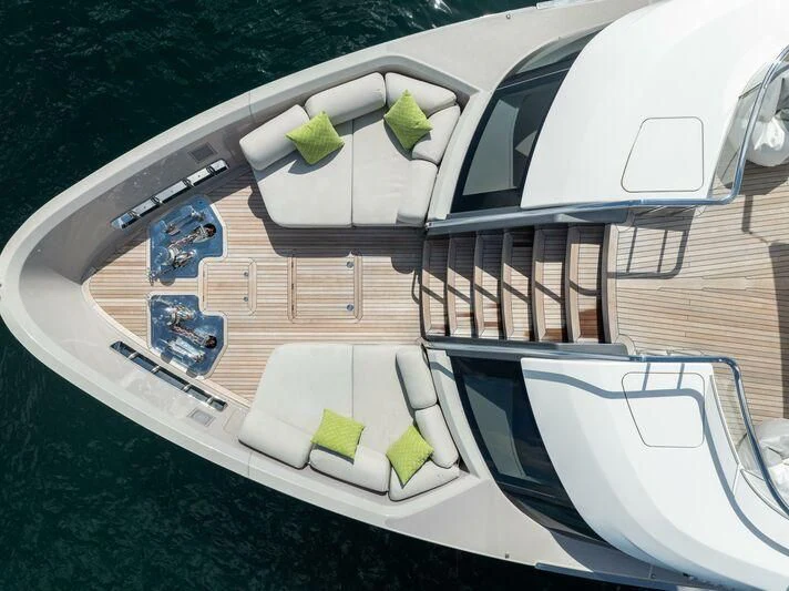 a white car with a plant growing out of it aboard JICJ Yacht for Sale