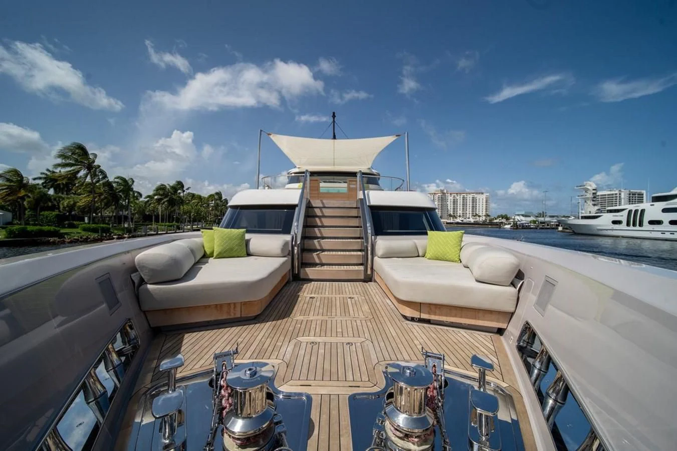 a deck with a boat and a dock with a boat on it aboard JICJ Yacht for Sale