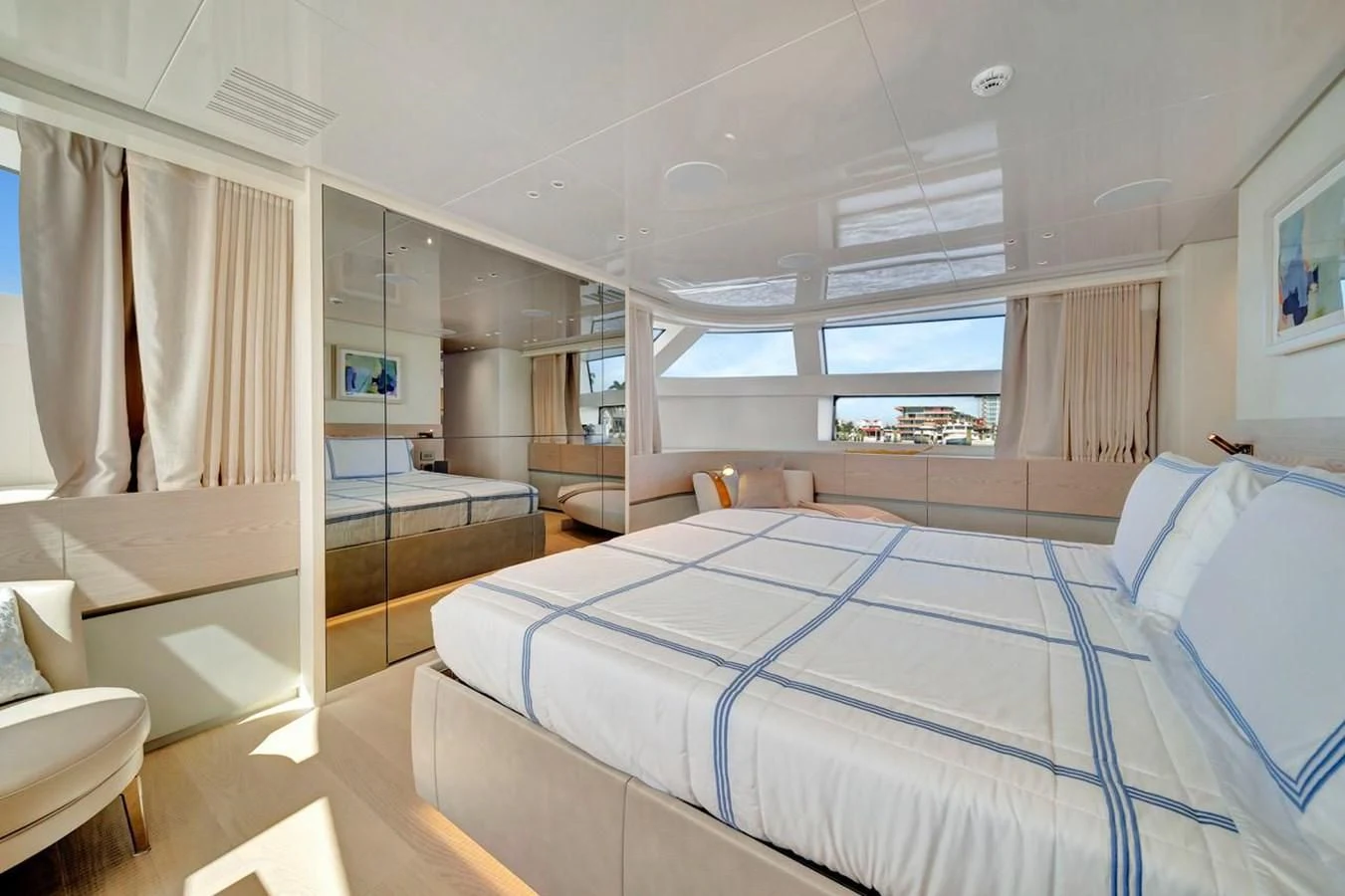 a room with a bed and a window aboard JICJ Yacht for Sale