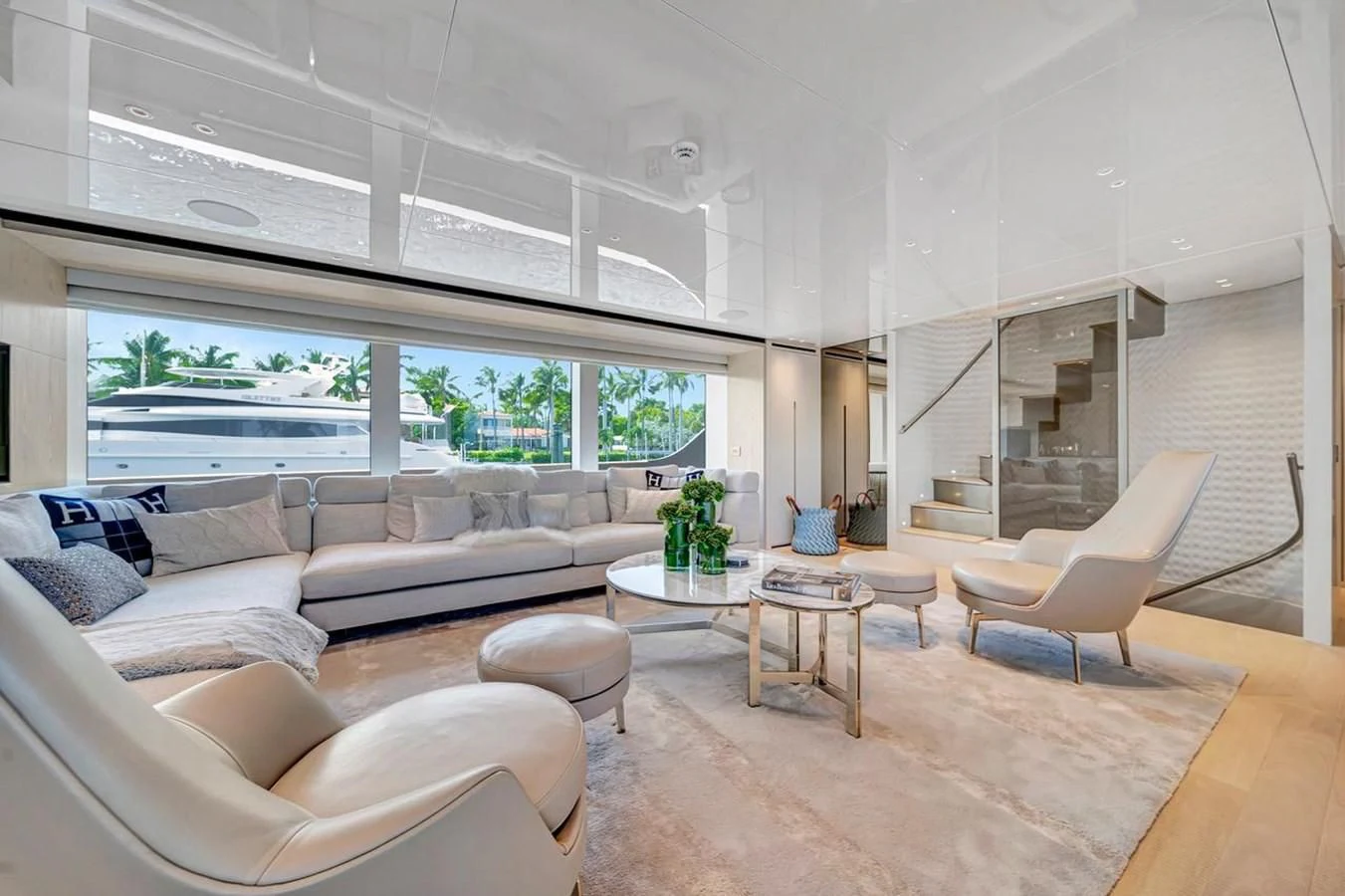 a living room with a large window aboard JICJ Yacht for Sale