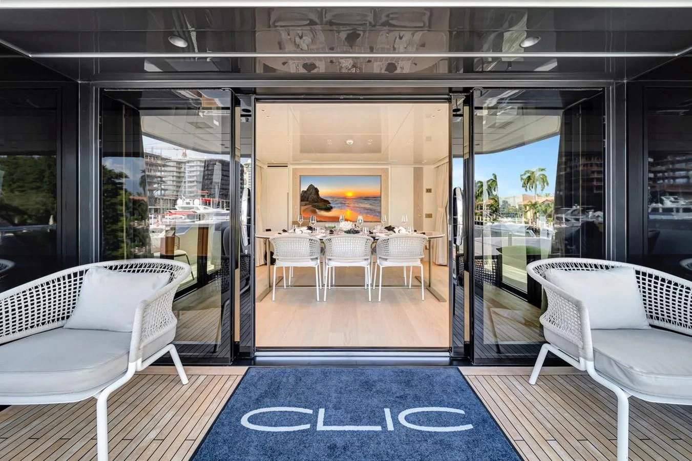 a room with a pool table and chairs aboard JICJ Yacht for Sale