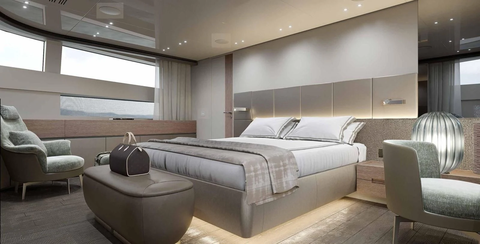 a room with a bed and a chair aboard JICJ Yacht for Sale