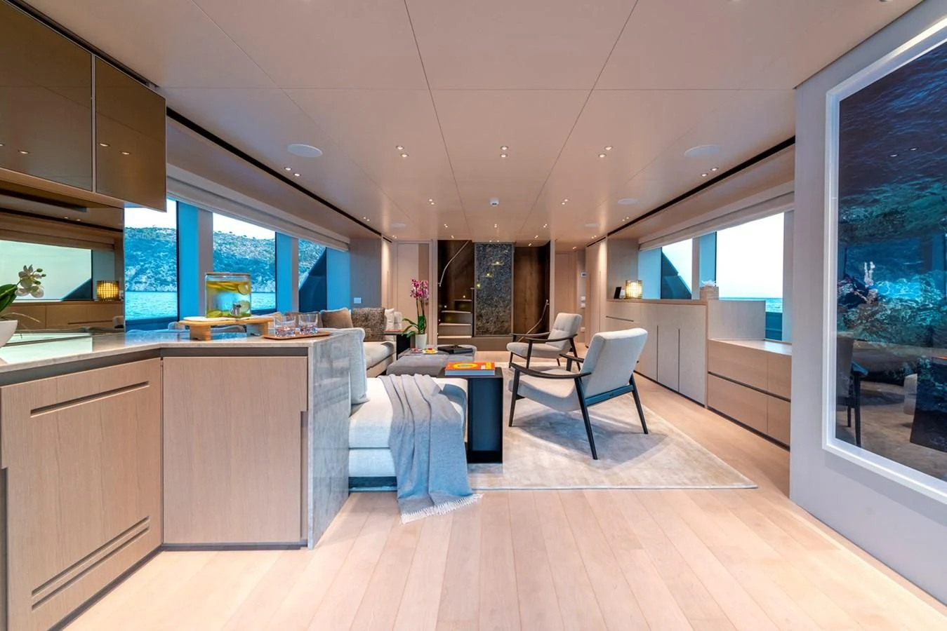 a modern looking kitchen with a large open floor plan aboard JICJ Yacht for Sale