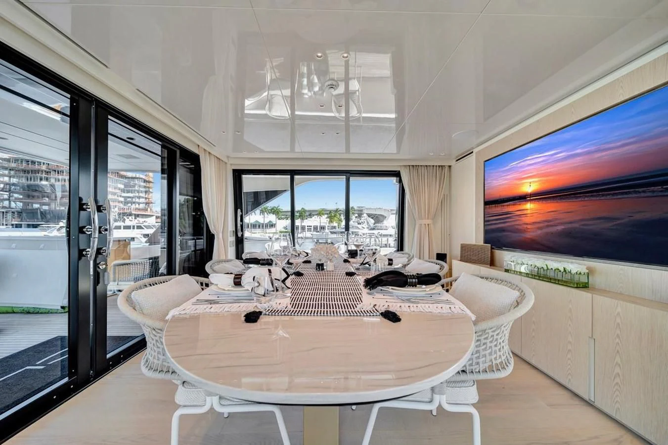 a large room with a large screen aboard JICJ Yacht for Sale
