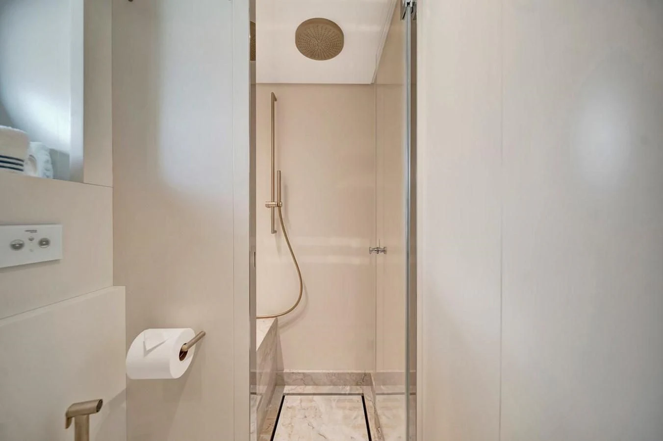 a bathroom with a shower unit aboard JICJ Yacht for Sale