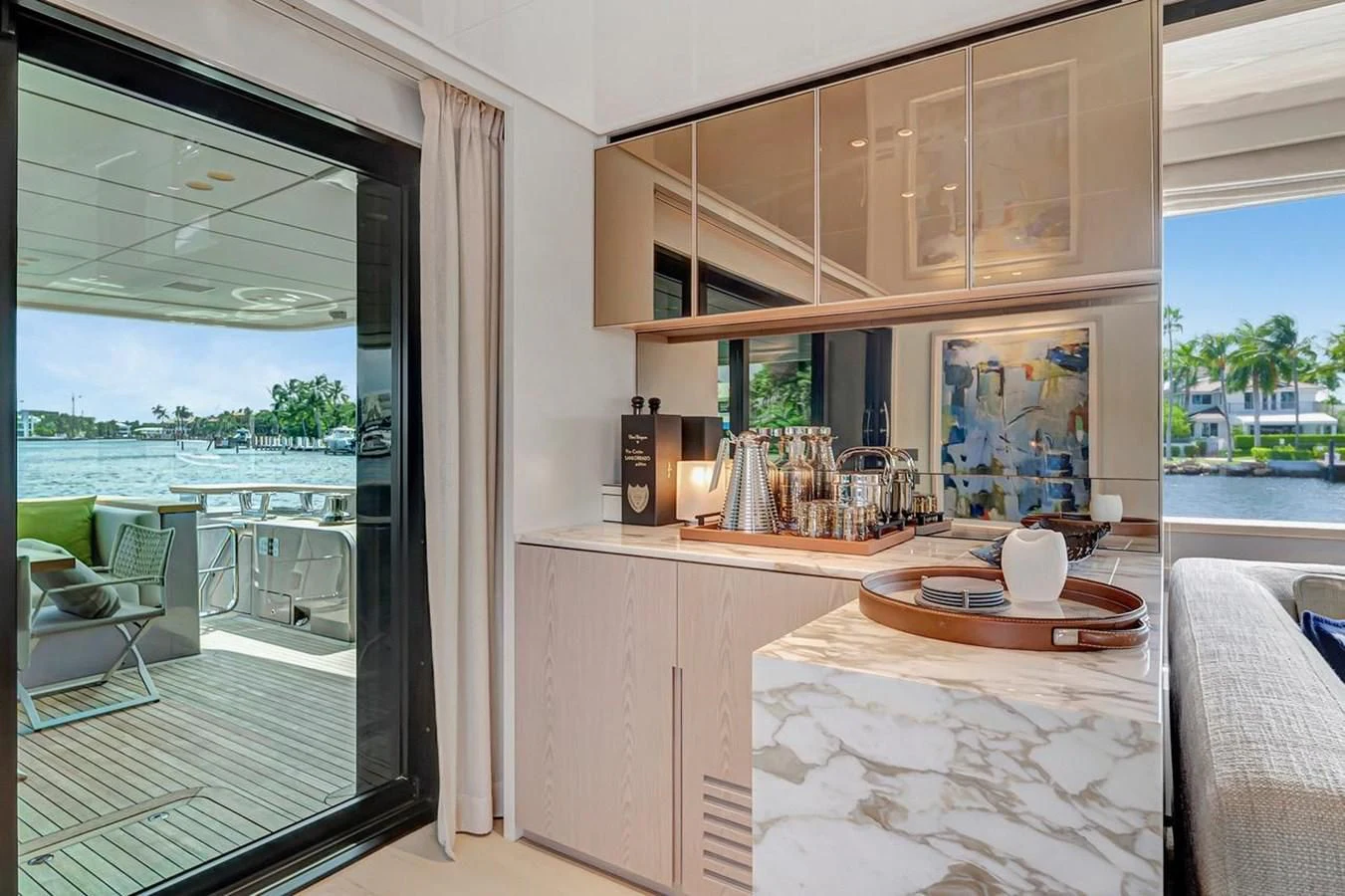 a kitchen with a large window aboard JICJ Yacht for Sale
