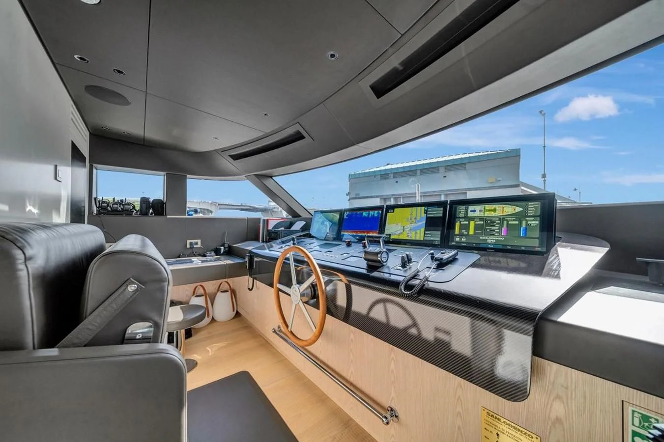 inside of a car with monitors and screens aboard JICJ Yacht for Sale