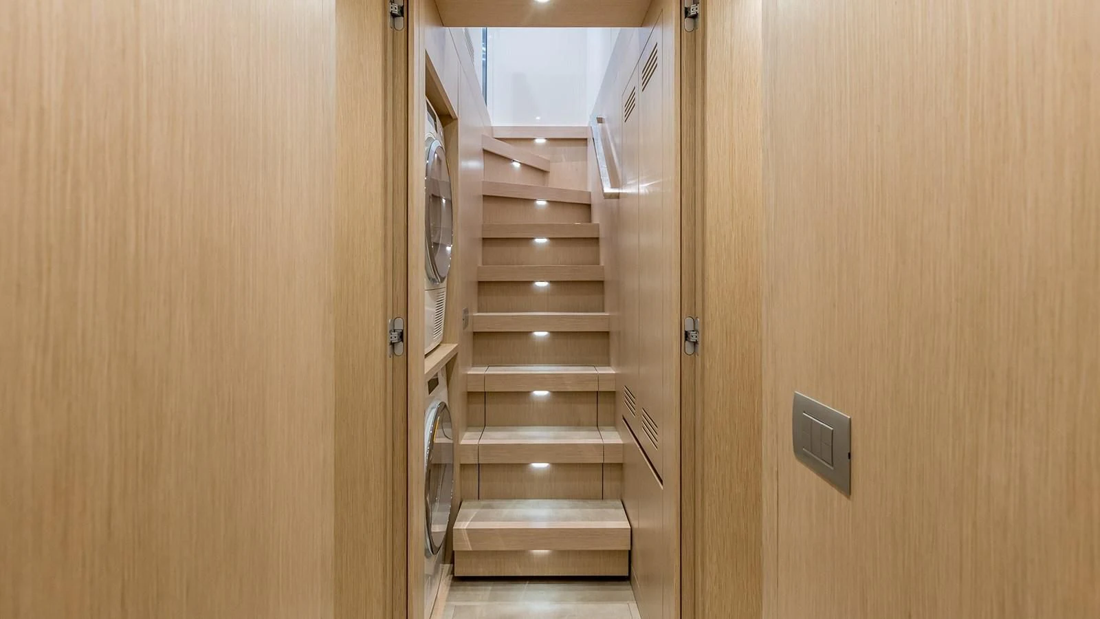 a wooden closet with a door aboard JICJ Yacht for Sale