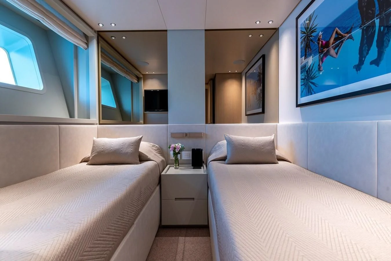 a room with two beds aboard JICJ Yacht for Sale