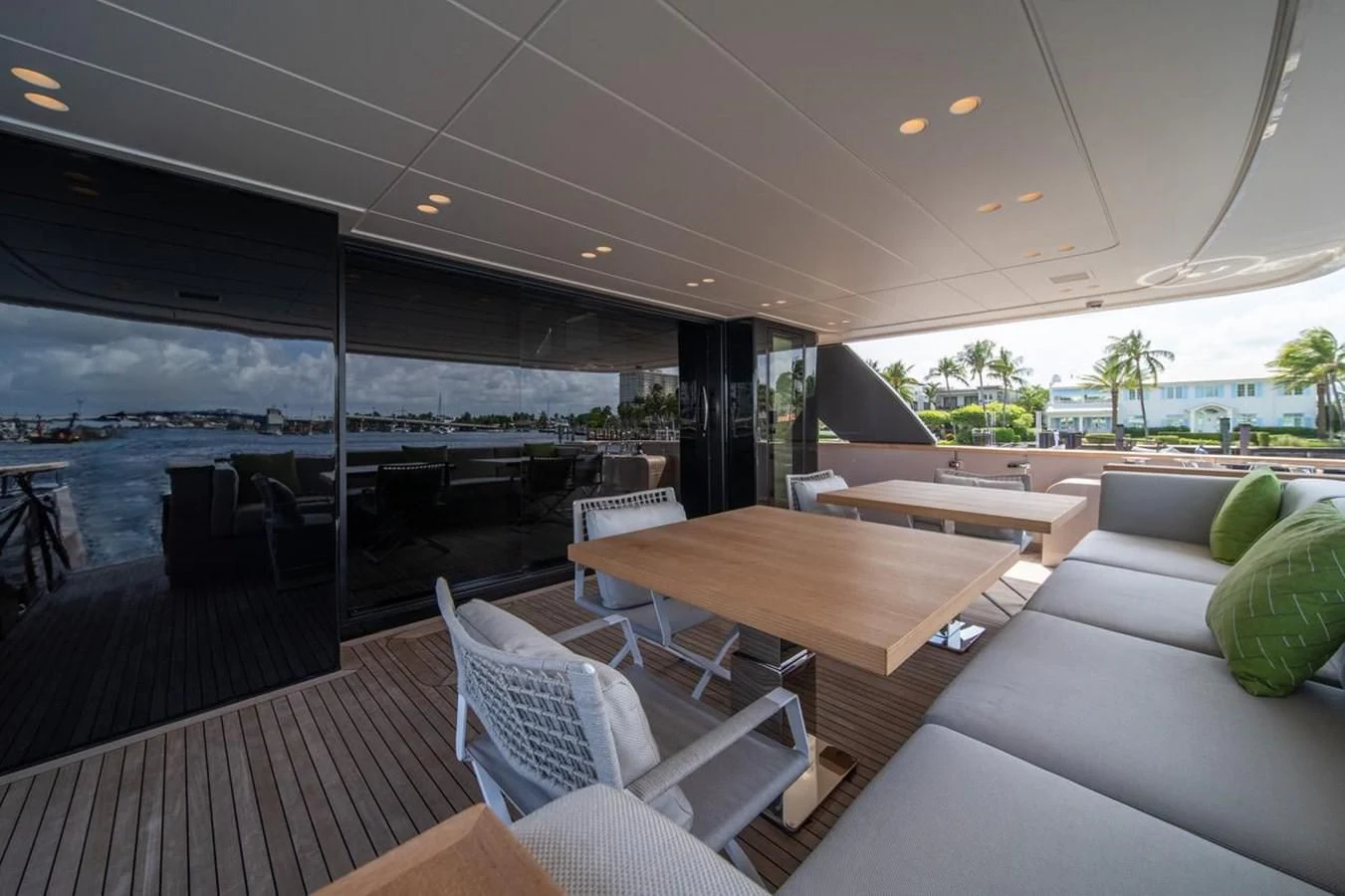 a room with a table and chairs aboard JICJ Yacht for Sale