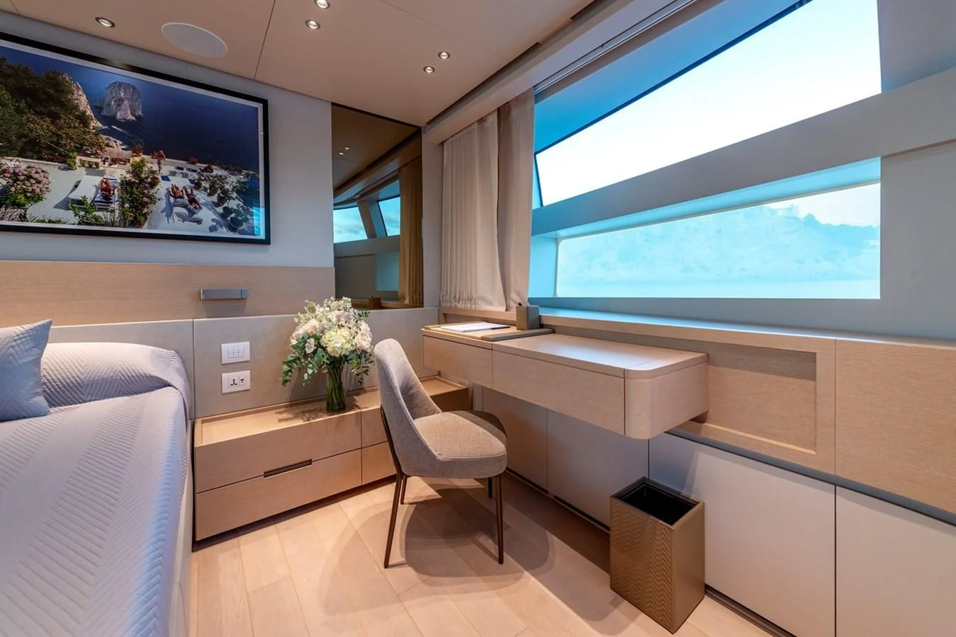 a room with a couch and a tv aboard JICJ Yacht for Sale