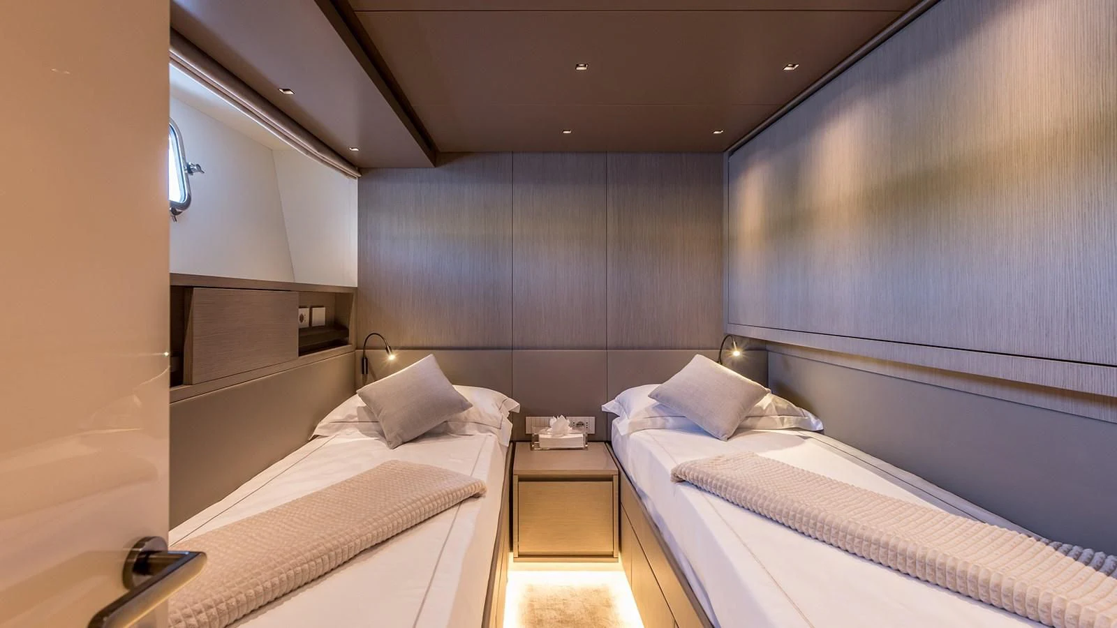 a room with two beds aboard JICJ Yacht for Sale