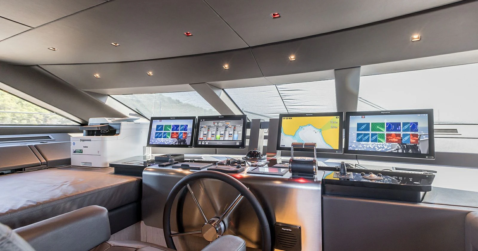 a room with several screens aboard JICJ Yacht for Sale