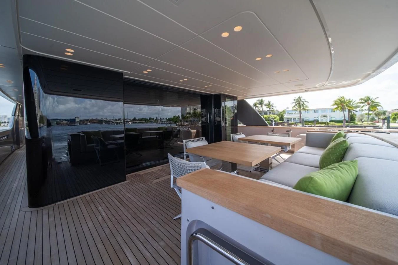 a room with a couch and a table aboard JICJ Yacht for Sale