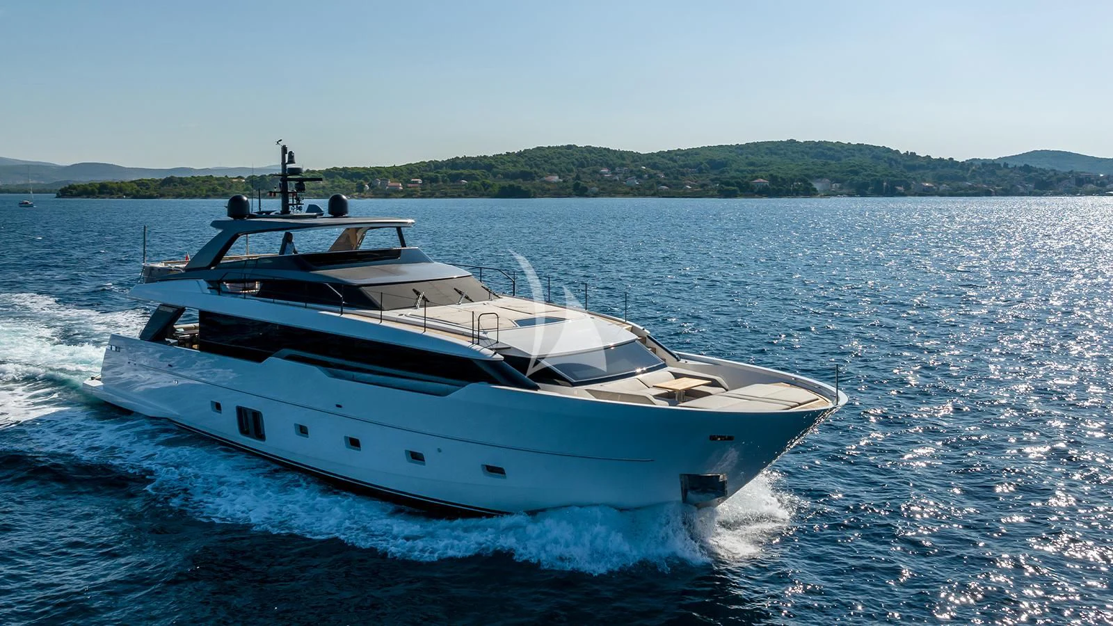 a white yacht on the water aboard JICJ Yacht for Sale