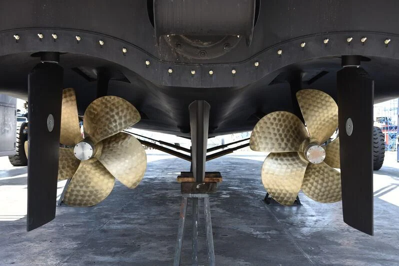 a car with rolls of hay aboard JICJ Yacht for Sale