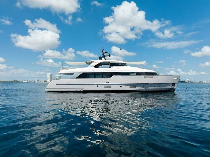 a white yacht in the water aboard JICJ Yacht for Sale