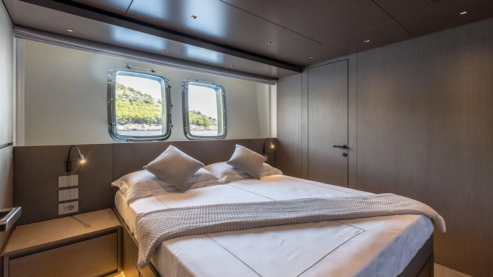 a bed in a room aboard JICJ Yacht for Sale