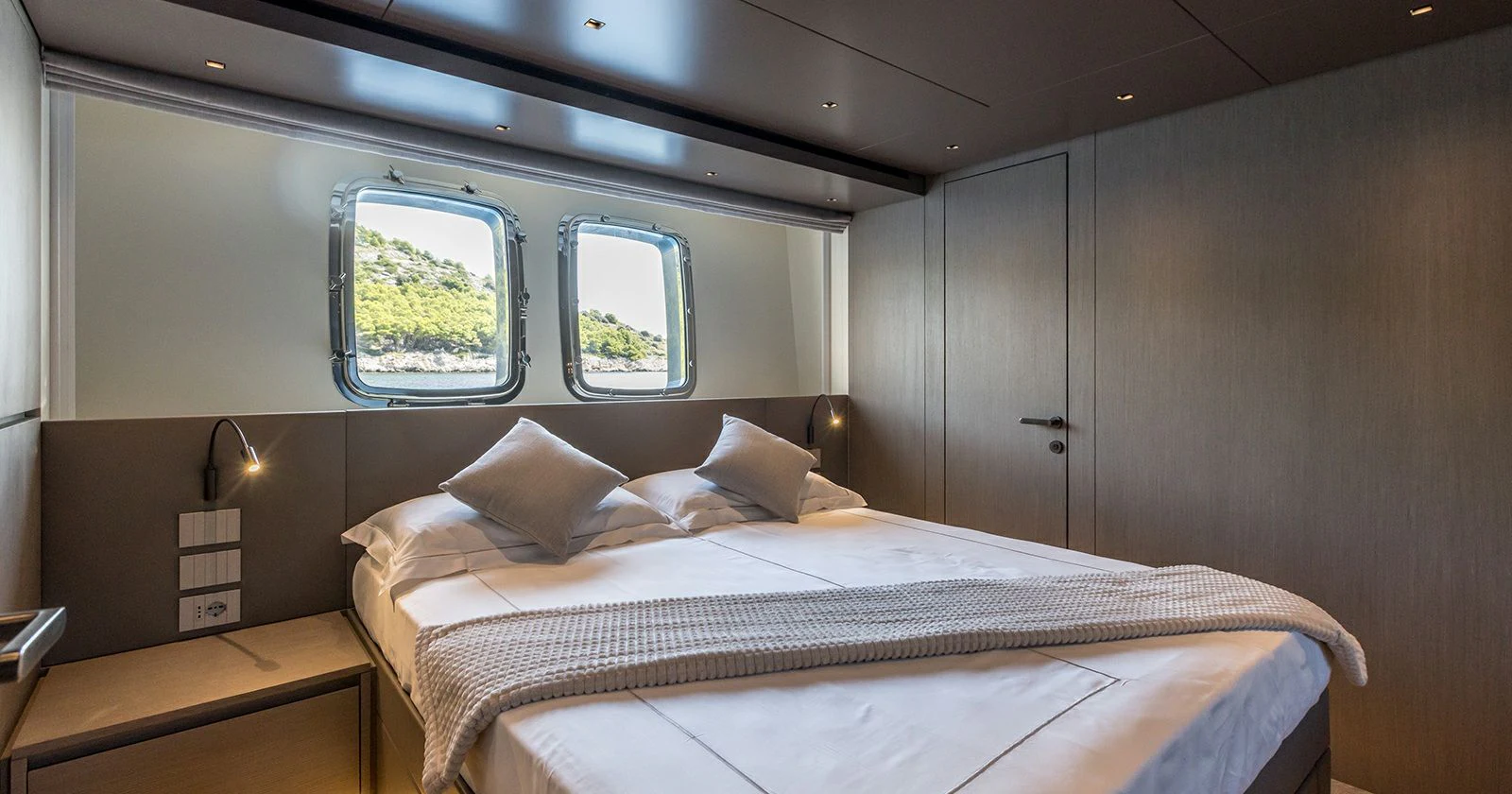 a bed in a room aboard JICJ Yacht for Sale