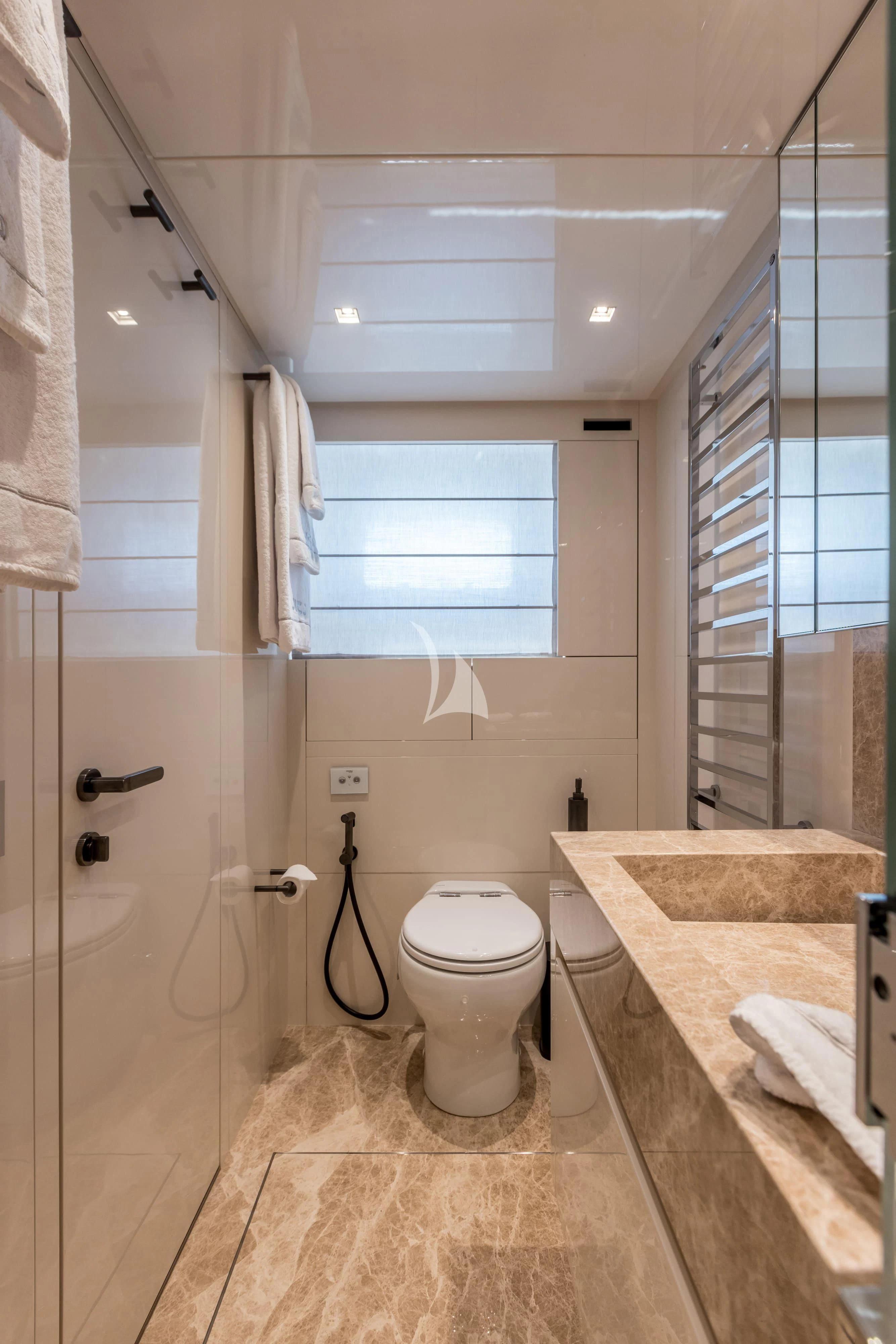 a bathroom with a sink toilet and a bathtub aboard JICJ Yacht for Sale