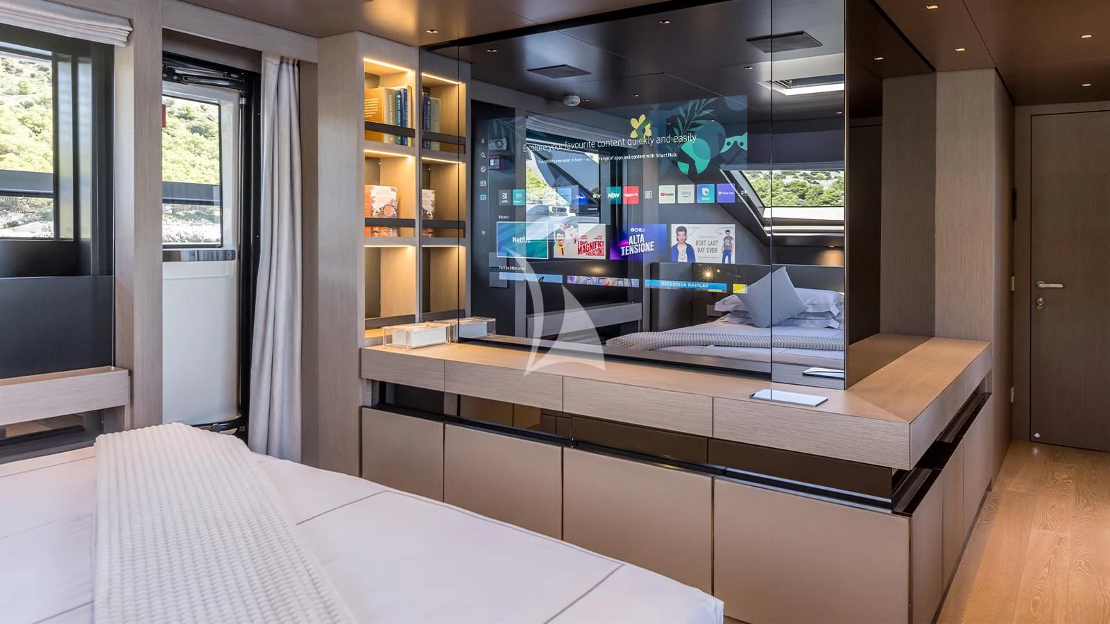 a room with a large mirror aboard JICJ Yacht for Sale
