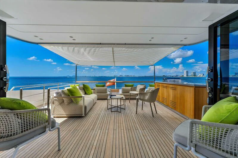 a room with a view of the ocean and the deck aboard JICJ Yacht for Sale