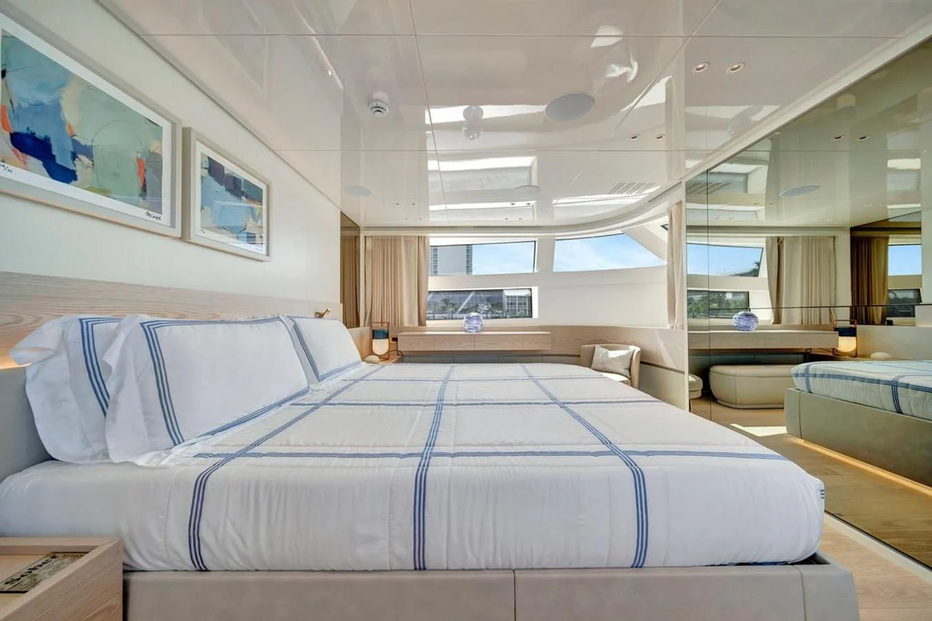 a large bed in a room aboard JICJ Yacht for Sale