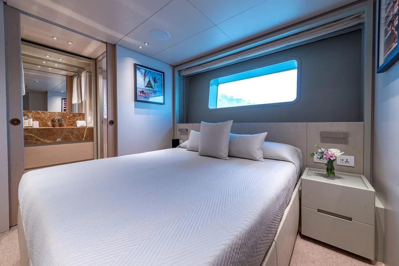 a bed in a room aboard JICJ Yacht for Sale