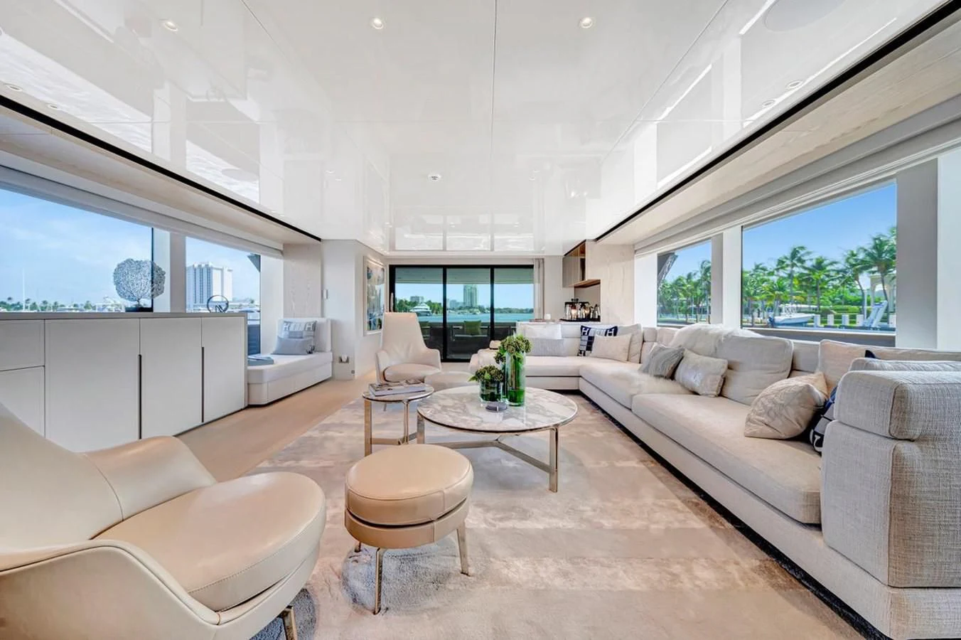 a living room with a couch and a coffee table aboard JICJ Yacht for Sale