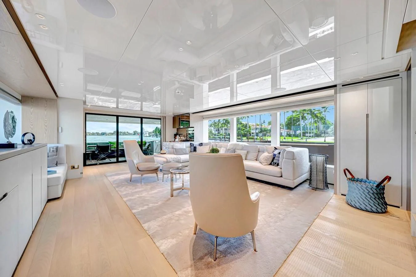 a living room with a large window aboard JICJ Yacht for Sale