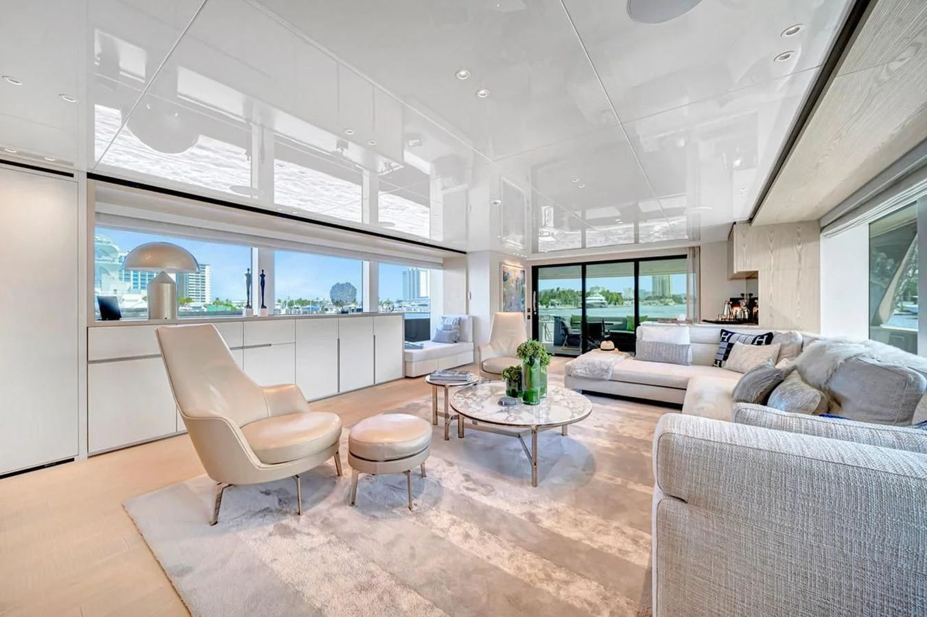 a living room with a large window aboard JICJ Yacht for Sale