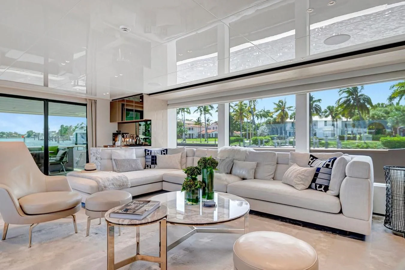 a living room with a large window aboard JICJ Yacht for Sale