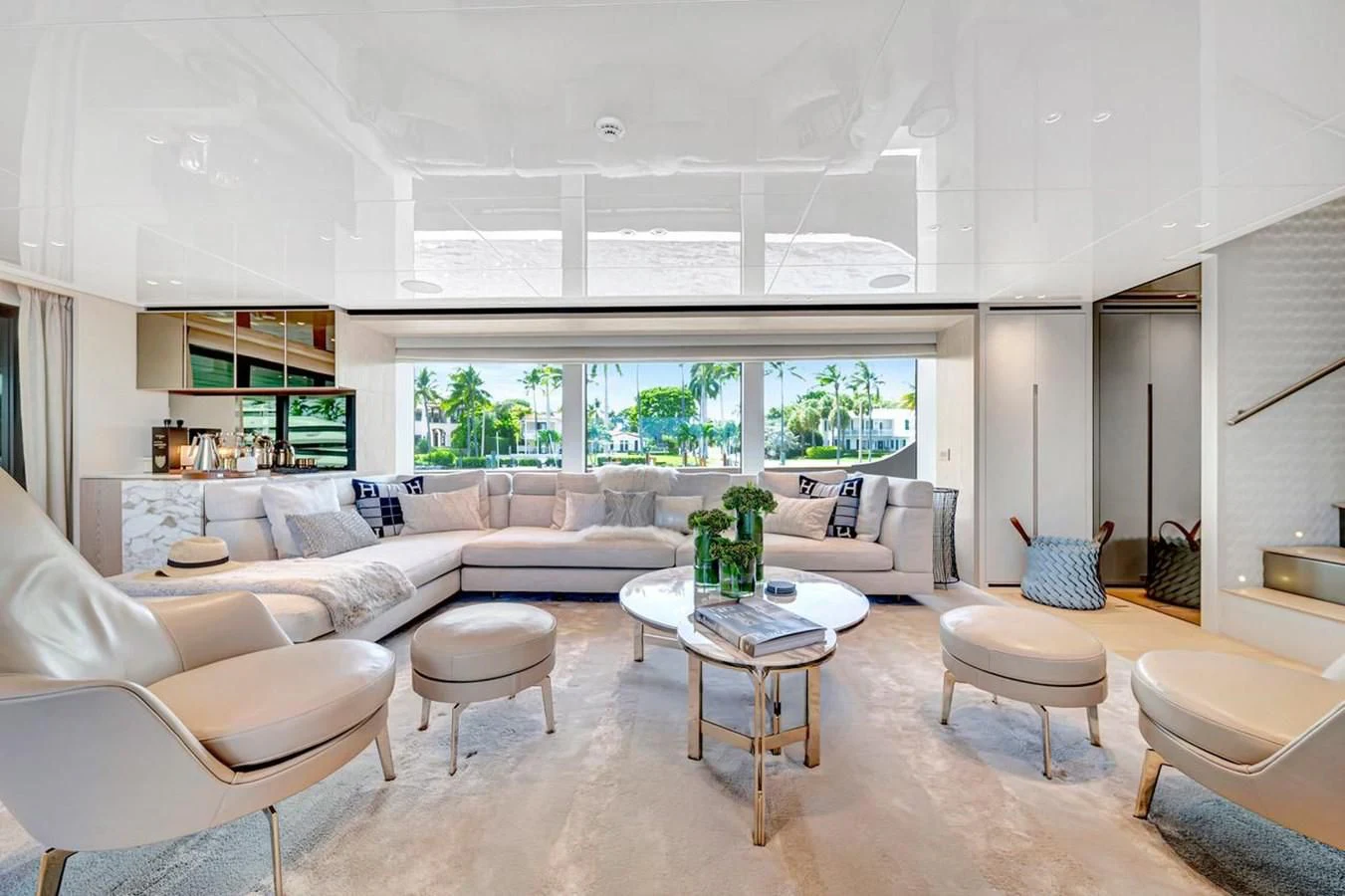 a living room with a large window aboard JICJ Yacht for Sale