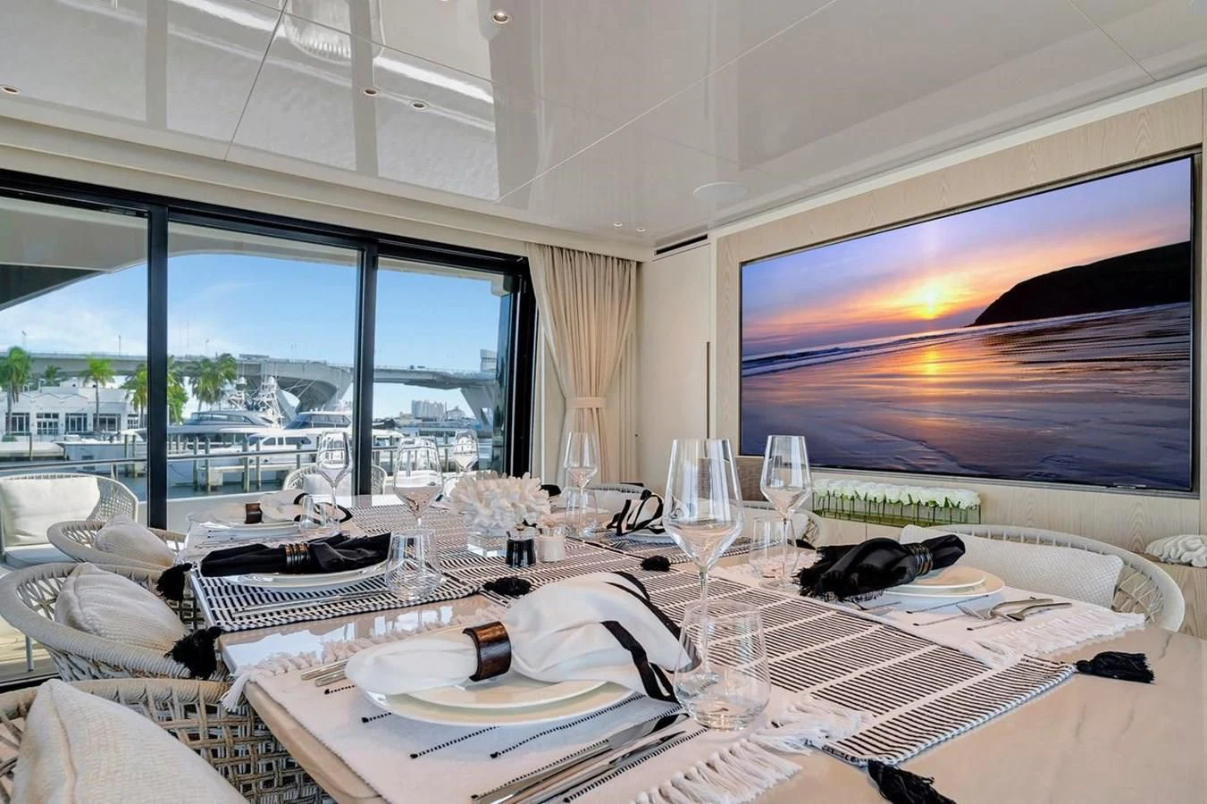 a room with a table and chairs aboard JICJ Yacht for Sale