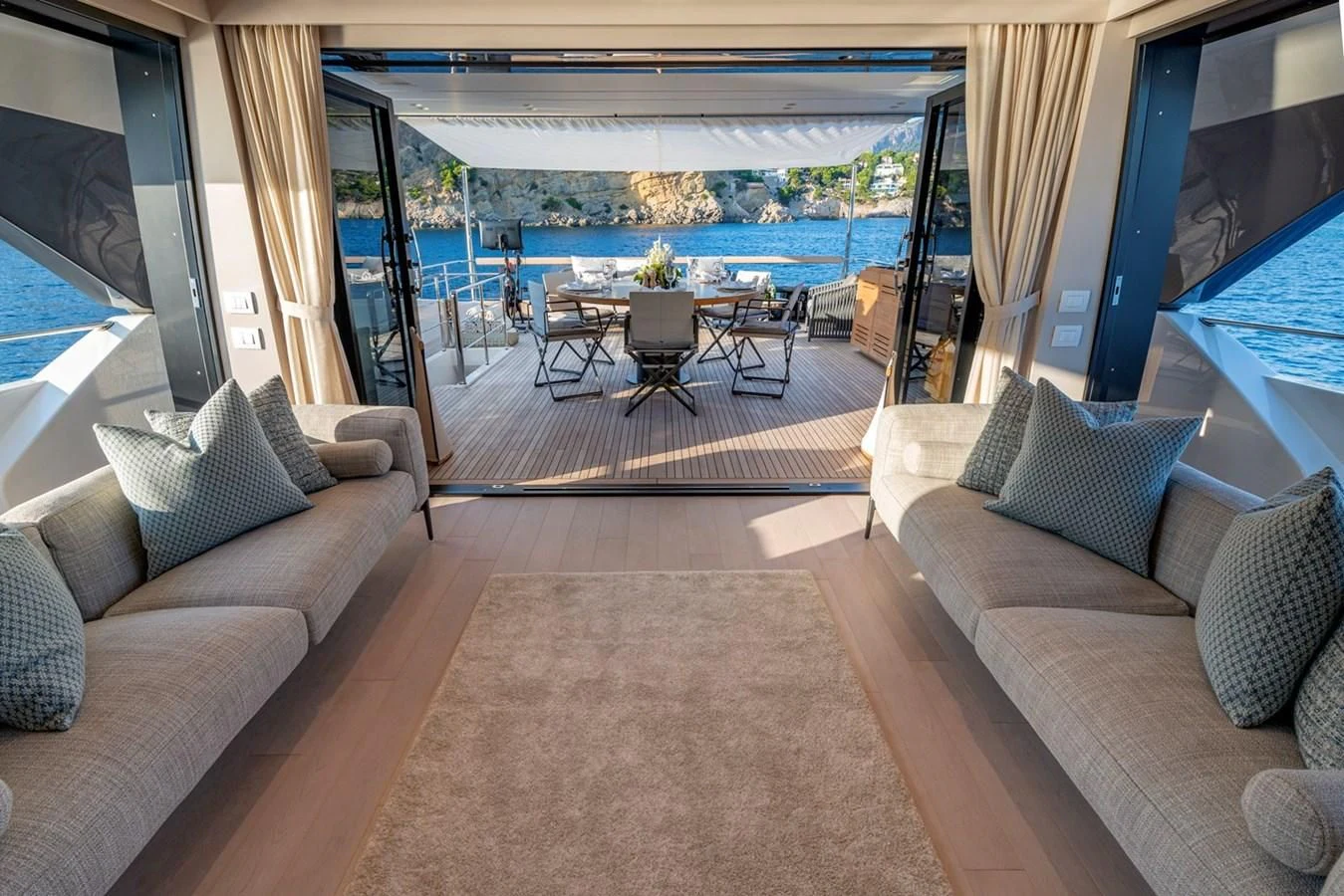 a living room with a large pool aboard JICJ Yacht for Sale