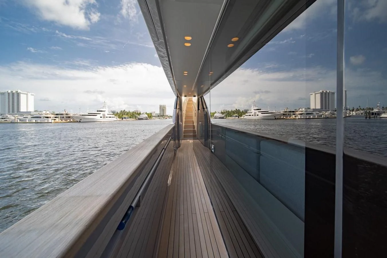 a wooden walkway over water aboard JICJ Yacht for Sale