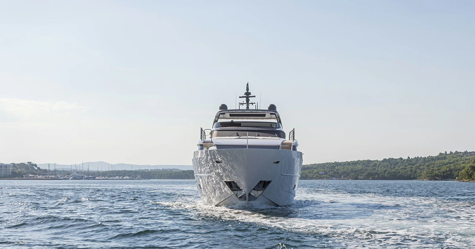 a large white ship in the water aboard JICJ Yacht for Sale