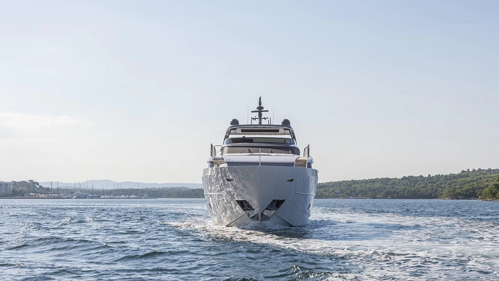 a large ship in the water aboard JICJ Yacht for Sale