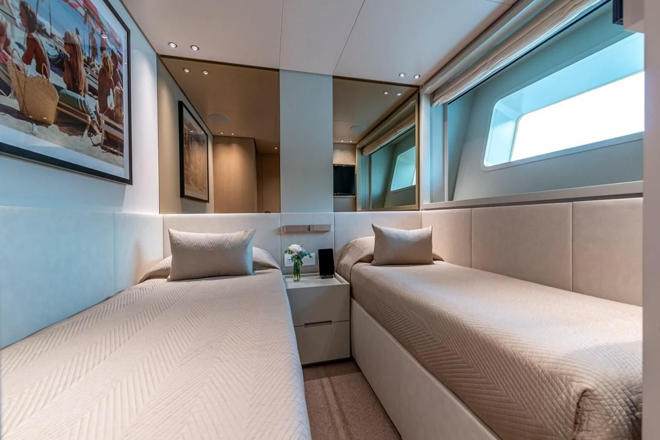 a room with two beds aboard JICJ Yacht for Sale