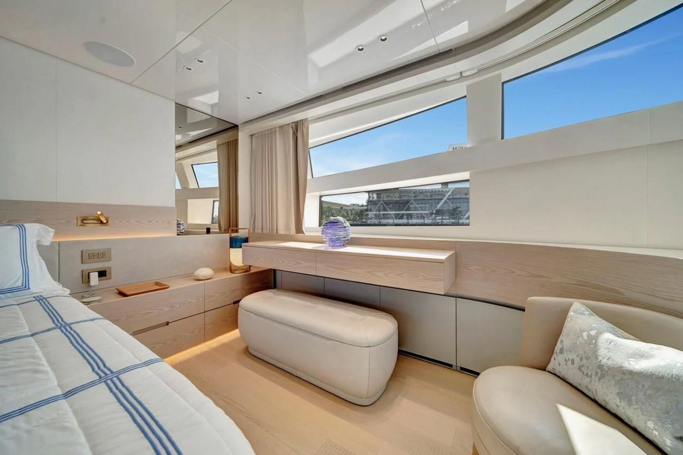 a room with a bed and a window aboard JICJ Yacht for Sale