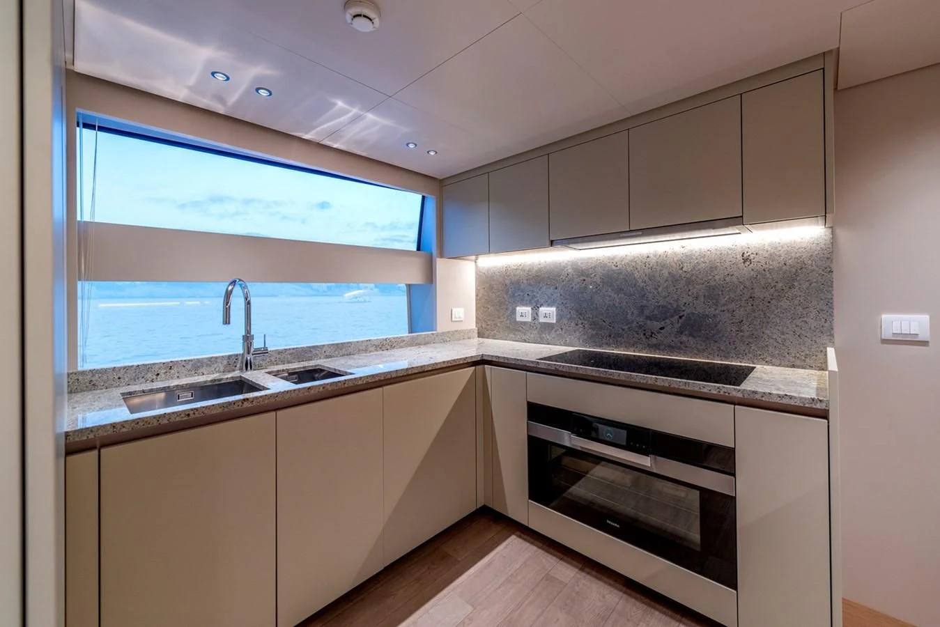 a kitchen with a microwave oven aboard JICJ Yacht for Sale