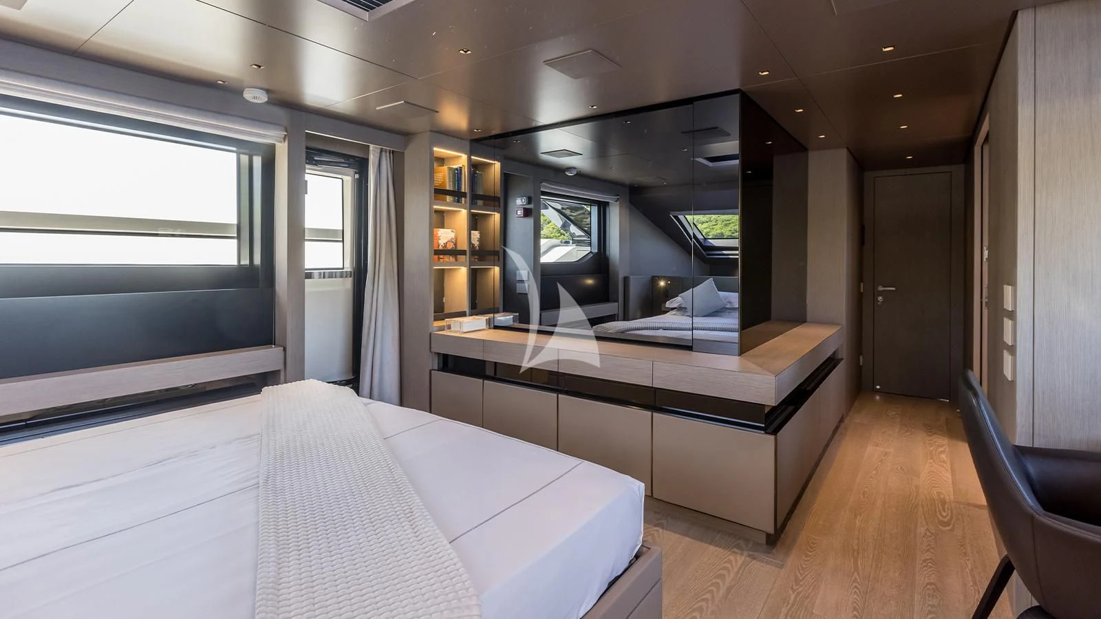 a room with a bed and a desk aboard JICJ Yacht for Sale
