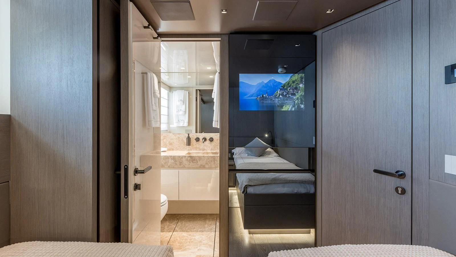 a bathroom with a large tv aboard JICJ Yacht for Sale