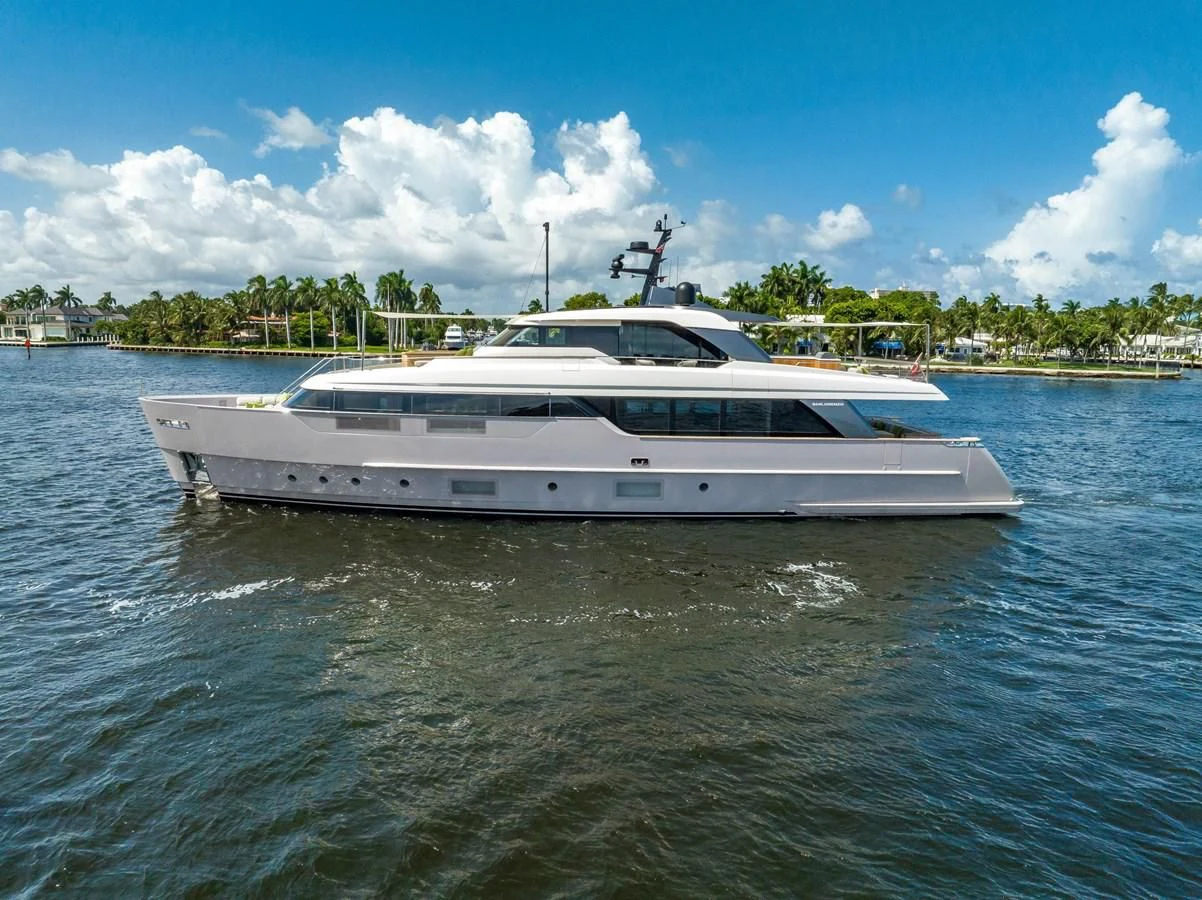 a white yacht in the water aboard JICJ Yacht for Sale