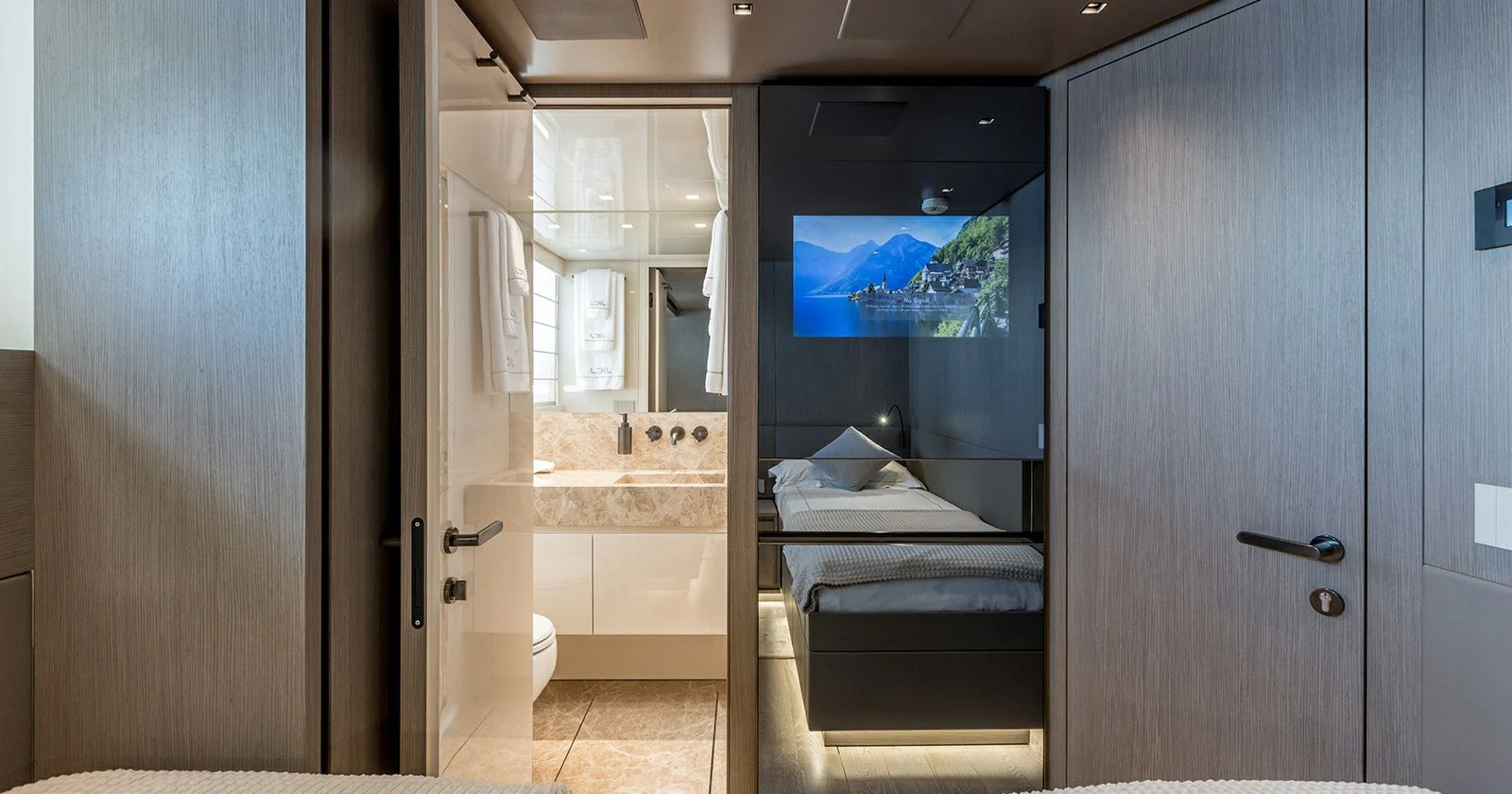 a bathroom with a large mirror aboard JICJ Yacht for Sale