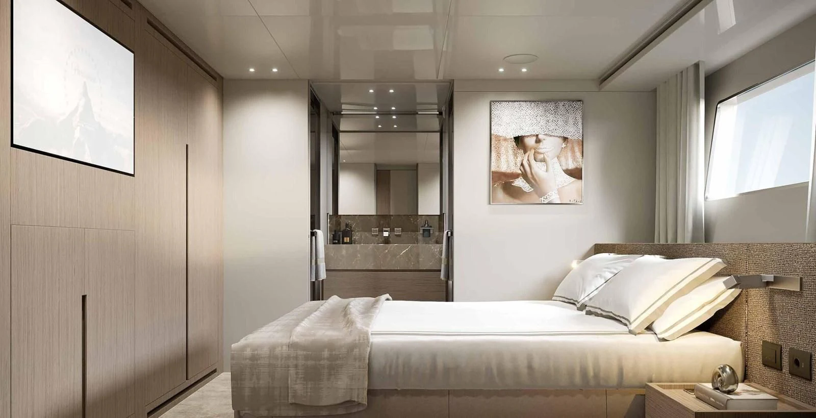 a bedroom with a bed and a mirror aboard JICJ Yacht for Sale