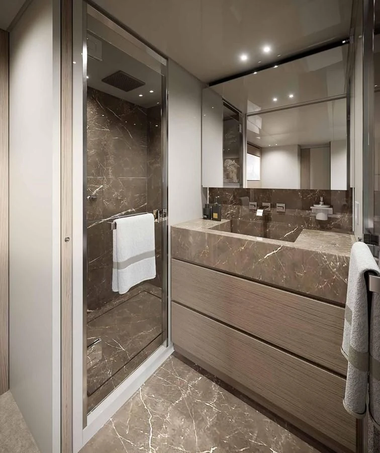 a bathroom with a large mirror aboard JICJ Yacht for Sale
