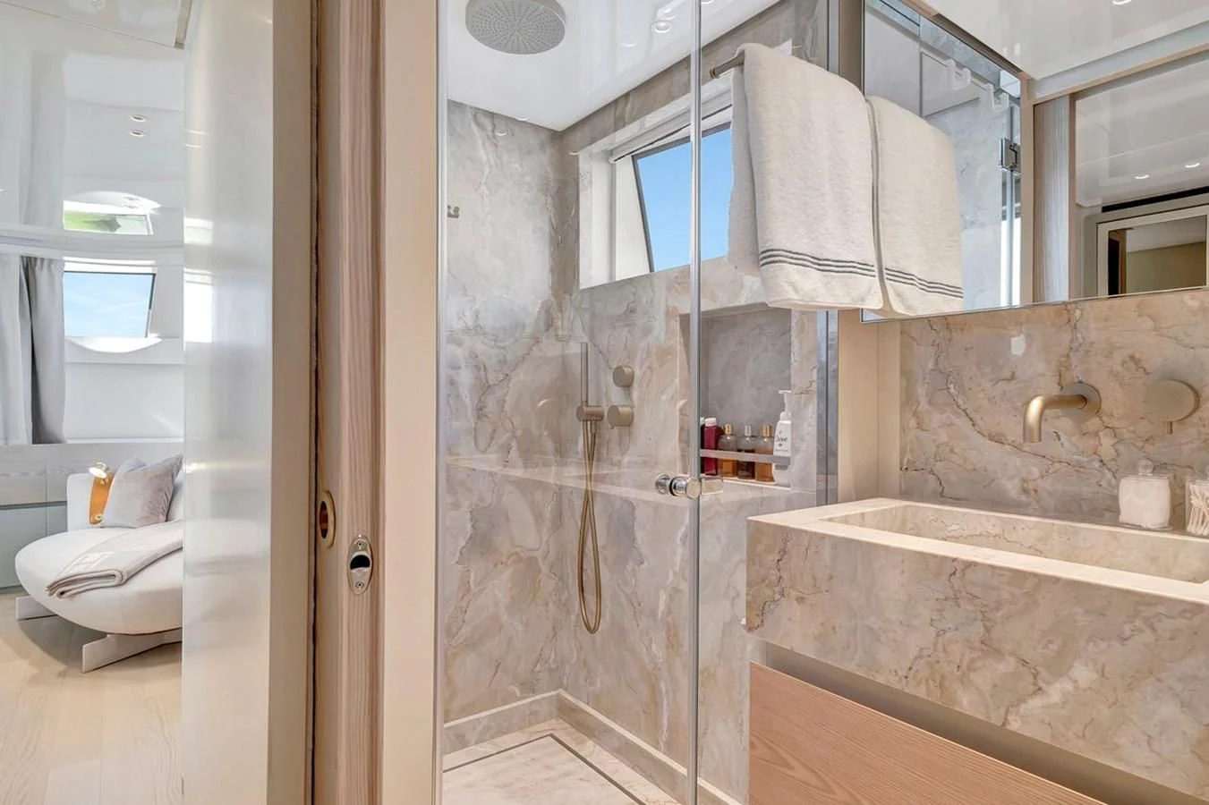 a bathroom with a sink and a mirror aboard JICJ Yacht for Sale