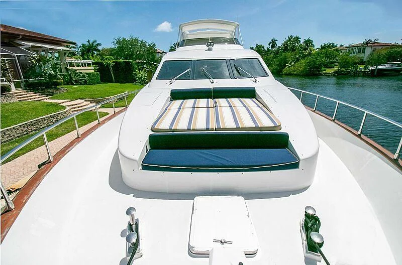 a white car with a roof aboard ALMAR Yacht for Sale