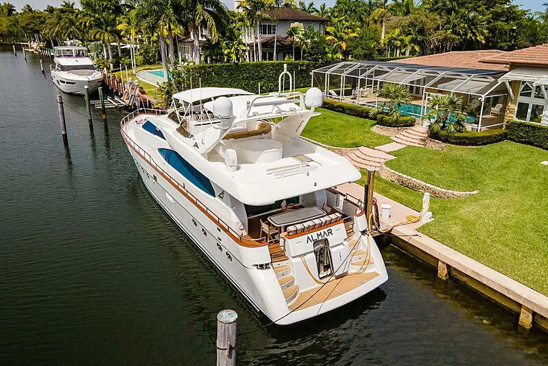 a boat docked at a pier aboard ALMAR Yacht for Sale
